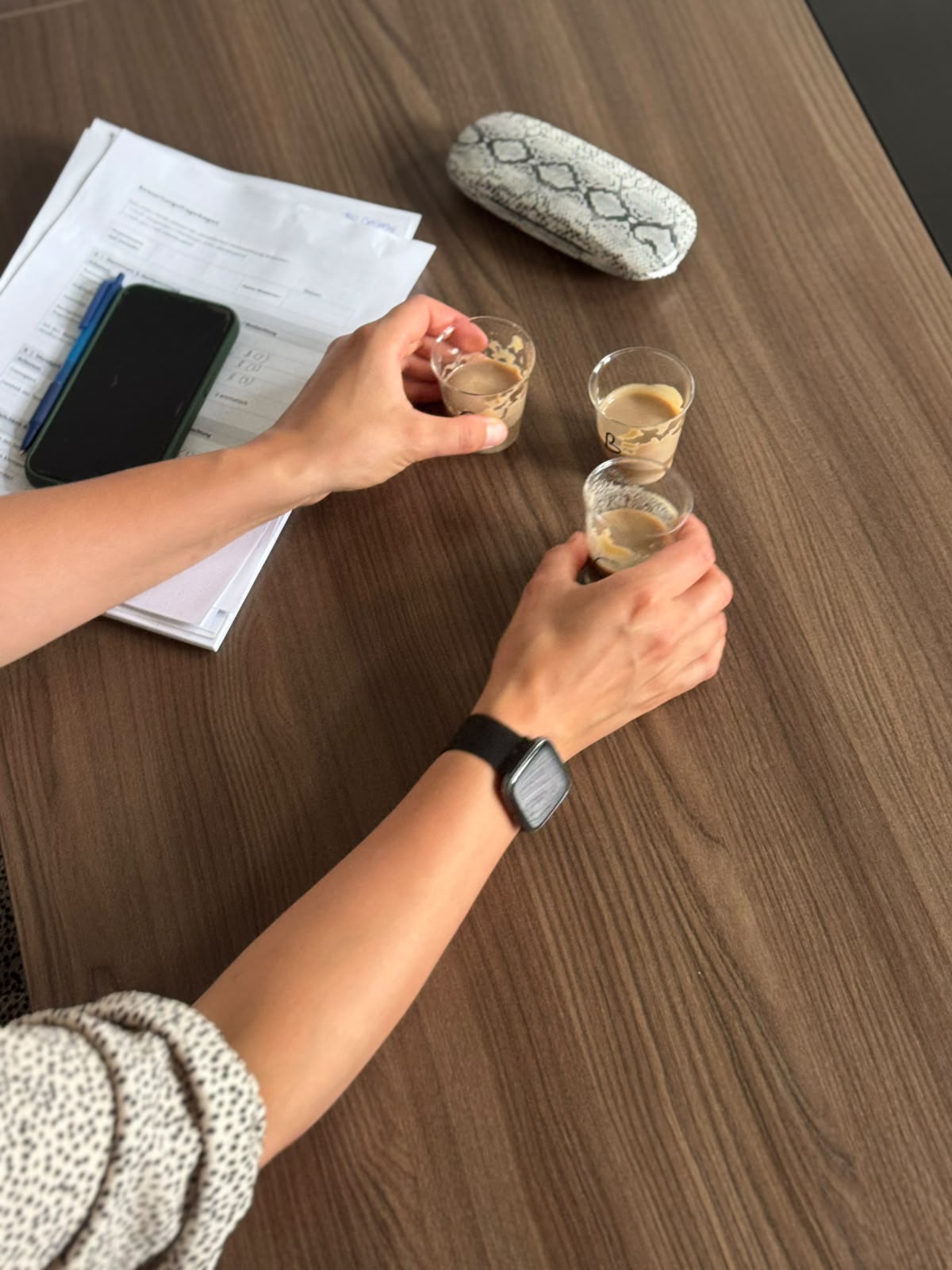ENUSEN team tasting product samples around a meeting table
